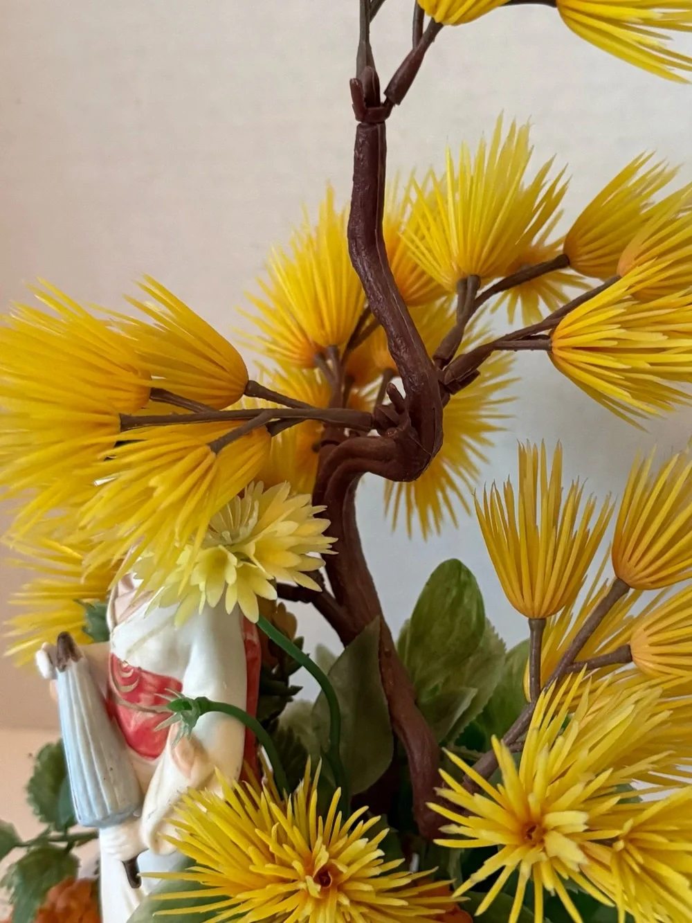 Vintage Japanese geisha figurine with artificial bonsai tree